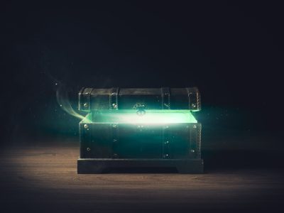Open,Pandora's,Box,With,Green,Smoke,On,A,Wooden,Background